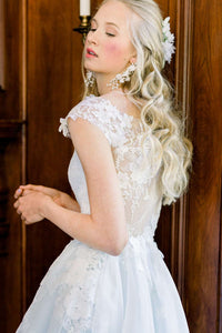 Charlotte, a showstopping blue organza wedding dress for a romantic bride. Designed by Catherine Langlois in Toronto, Ontario, Canada. Headpiece by The Loved One.