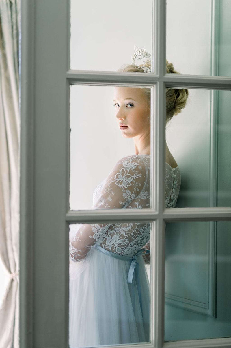 Romantic tulle wedding dress with boat neckline and long lace sleeves. Custom designed by Catherine Langlois, Toronto, Ontario, Canada.