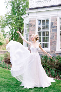 Gorgeous Bronte, an organza and tulle wedding dress by Catherine Langlois. Delicate vine applique on the skirt. Photo by Whitney Heard.