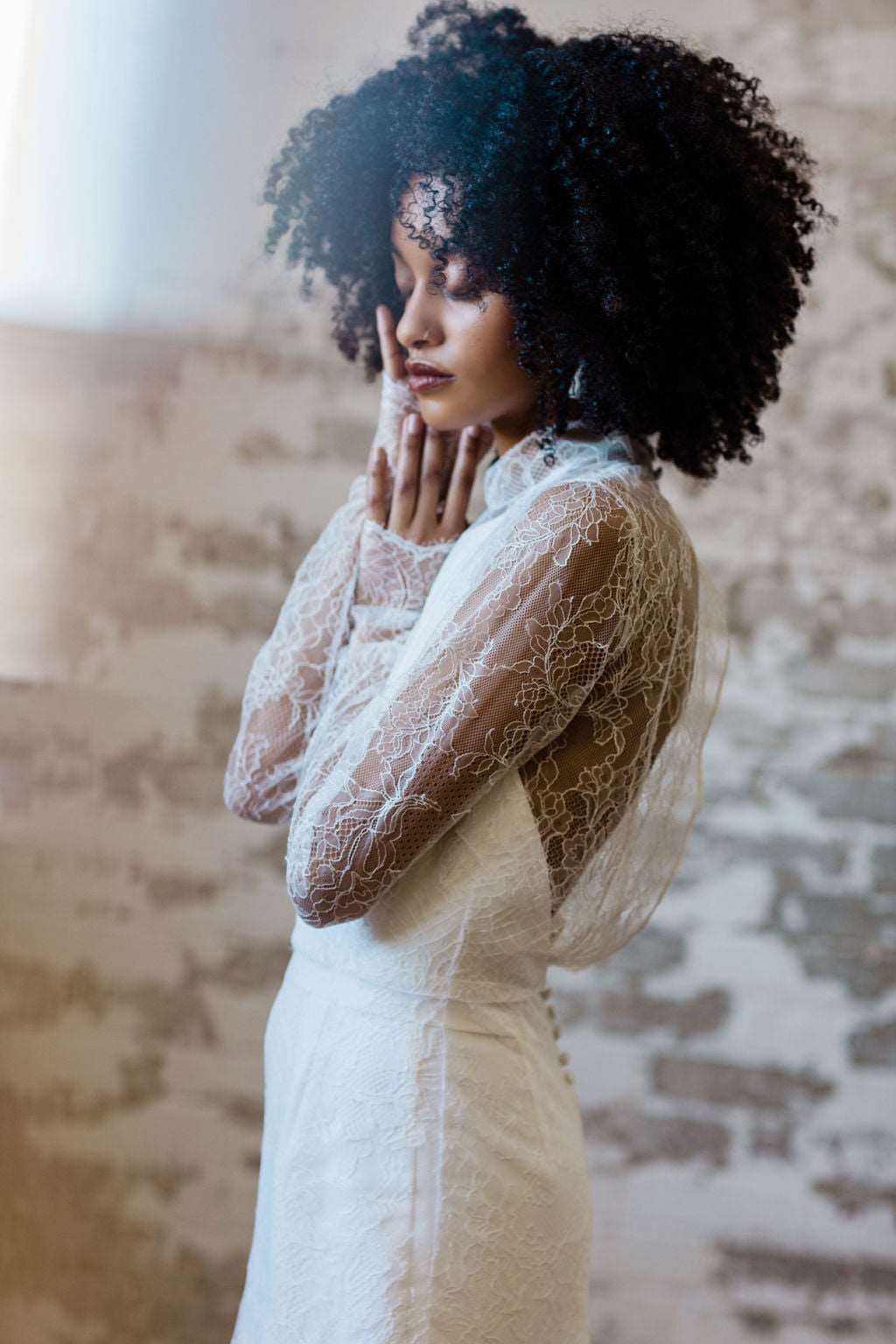 High neck Chantilly lace wedding dress overlay long sleeves. Bridal separates. Custom made in Toronto, Canada.