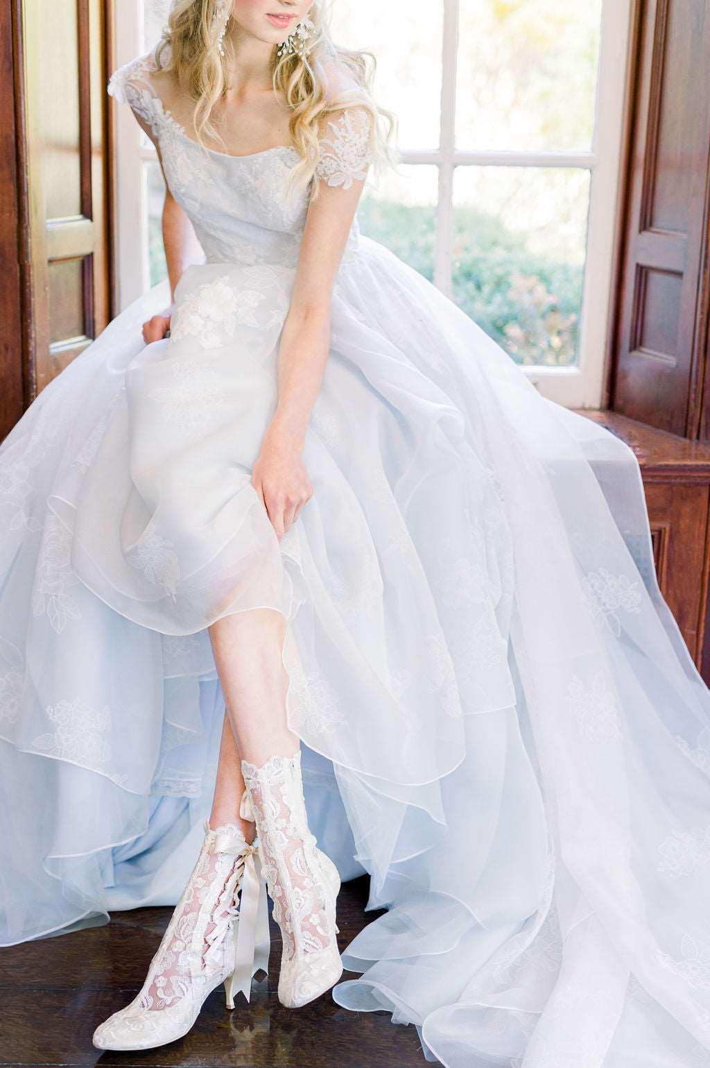Charlotte, a showstopping blue organza wedding dress for a romantic bride. Designed by Catherine Langlois in Toronto, Ontario, Canada. Headpiece by The Loved One.