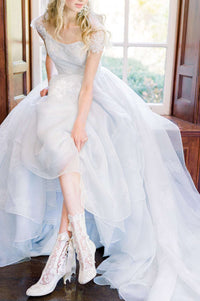 Charlotte, a showstopping blue organza wedding dress for a romantic bride. Designed by Catherine Langlois in Toronto, Ontario, Canada. Headpiece by The Loved One.