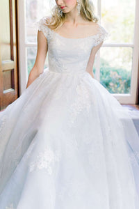 Charlotte, a showstopping blue organza wedding dress for a romantic bride. Designed by Catherine Langlois in Toronto, Ontario, Canada. Headpiece by The Loved One.