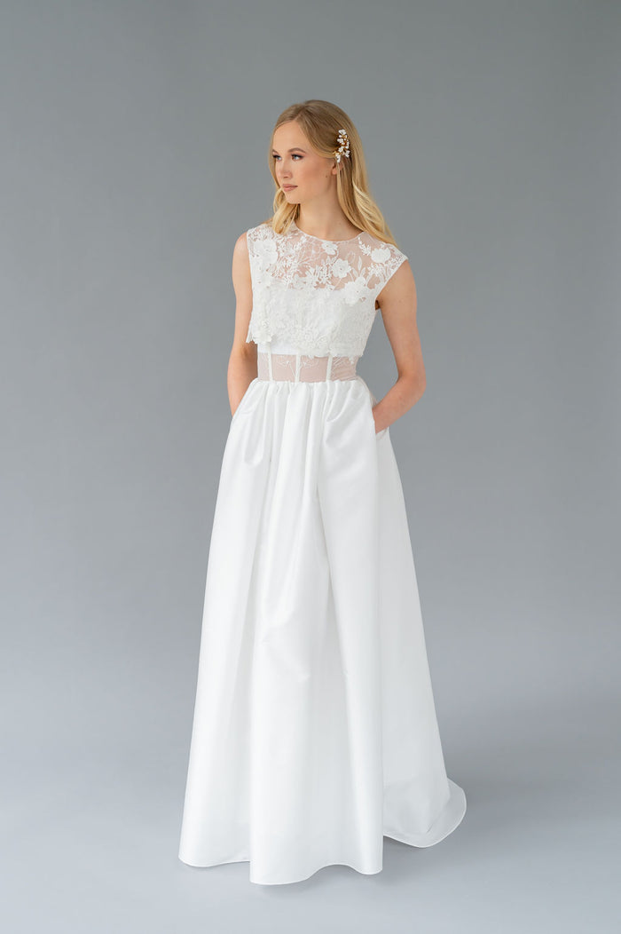 Playful romantic wedding dress, handmade by Catherine Langlois. Features pockets, a removable topper and corset detailing.