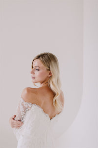 Off the shoulder modern wedding dress. Custom made by Catherine Langlois, Toronto bridal studio