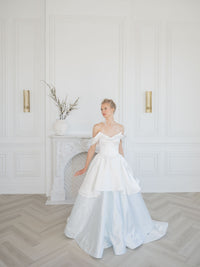 Dramatic satin wedding gown with a big bridal bow. Demi couture wedding dresses by Catherine Langlois, Toronto