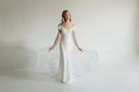 Vintage inspired satin bias empire line wedding dress. Embroidered train. Hand made in our Toronto Atelier.