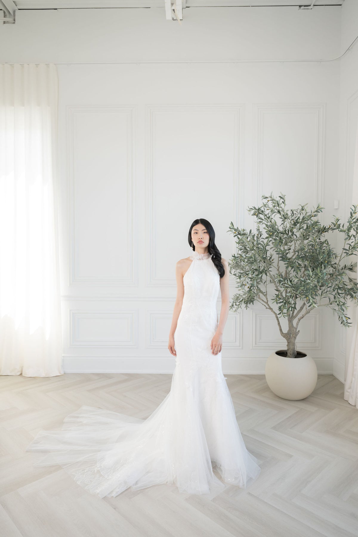 Pretty floral tulle halter neck wedding dress. Custom couture wedding dresses by Catherine Langlois Bridal, Toronto.