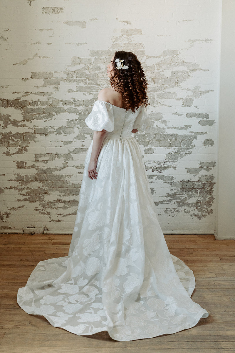 Romantic textured wedding dress. Off the shoulder, puffed sleeves. Handmade in Canada.