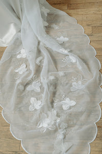 Vintage inspired satin bias empire line wedding dress. Embroidered train. Custom made in Toronto from reclaimed Italian fabric.