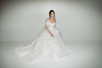 Made to measure designer corset wedding dress ballgown. Handmade roses on tulle. Designed in our atelier in Toronto, Canada.