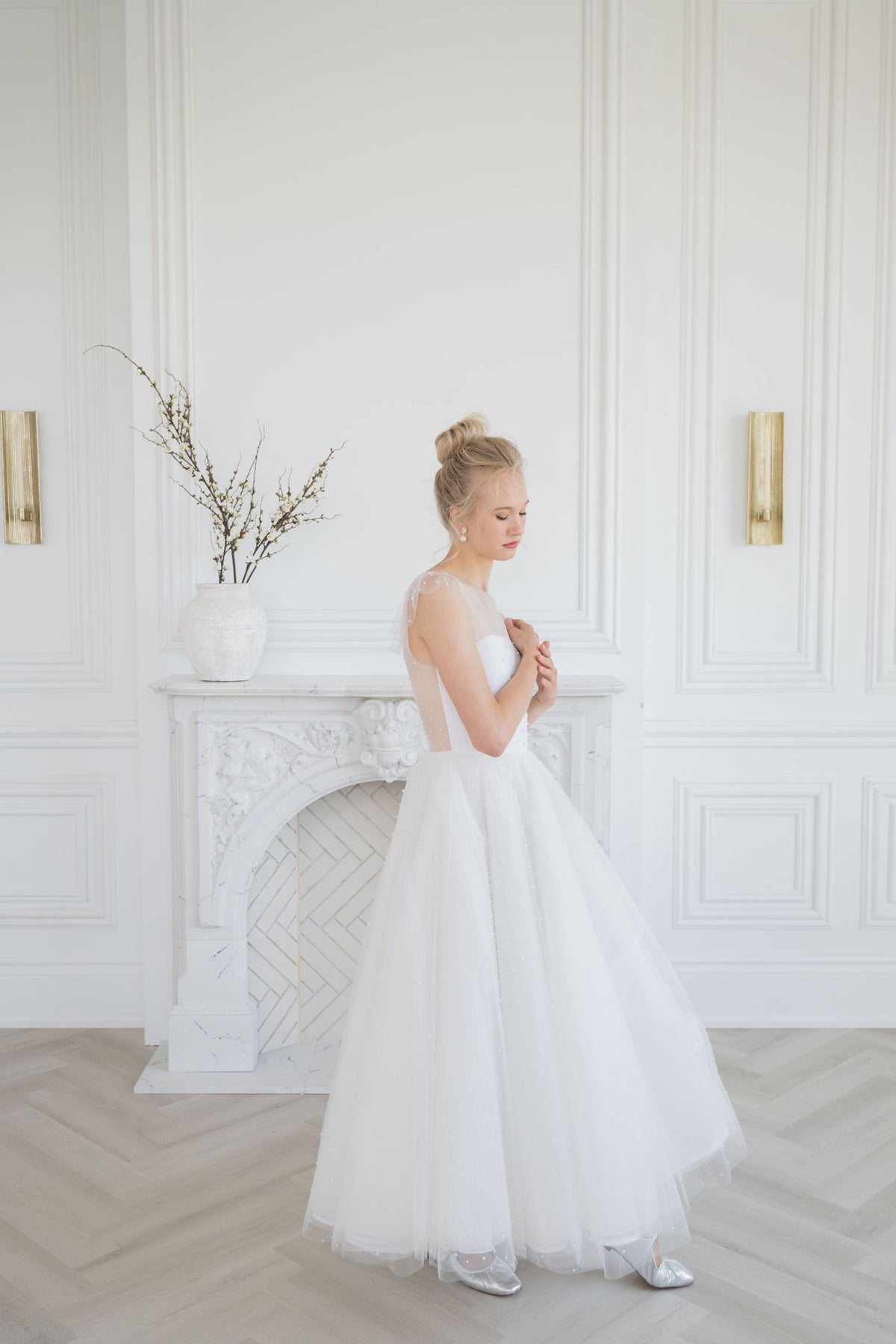 Crystal tulle ballet core wedding dress. Tea length wedding dress with flutter sleeves and a sheer back. Handmade by Catherine Langlois, Toronto, Ontario