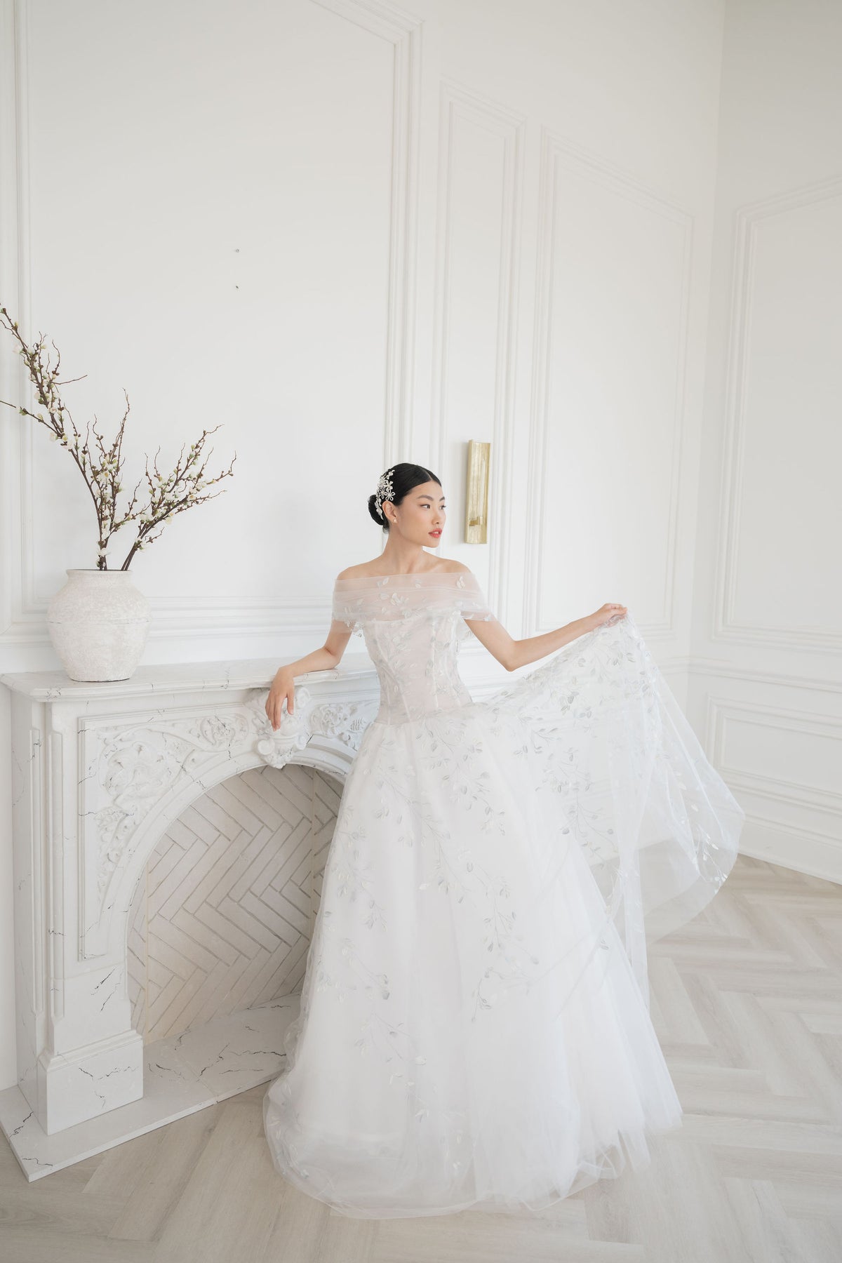 Off the shoulder blue crystal tulle wedding dress. Dropped waist corset. Demi couture wedding dresses by bridal gown designer Catherine Langlois, Toronto. 