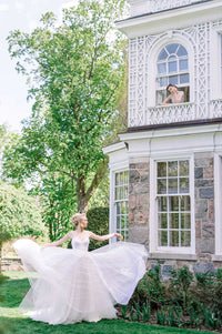 Gorgeous Bronte, an organza and tulle wedding dress by Catherine Langlois. Delicate vine applique on the skirt. Photo by Whitney Heard.