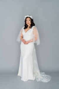 Elegant, simple off the rack wedding dress. Made  in Toronto, Canada