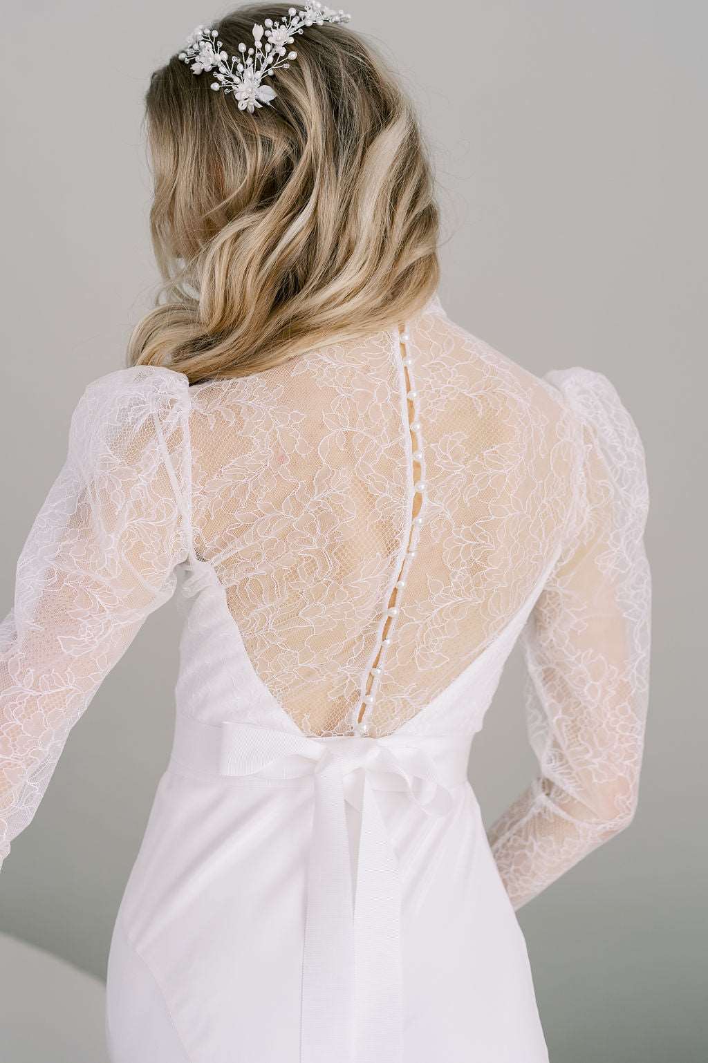 High neck Chantilly lace wedding top with slim puff sleeves.. Handmade by Catherine Langlois, Toronto, Canada