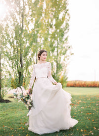 Extraordinary romantic champagne tulle wedding dress. From the Loveblooms collection by Catherine Langlois