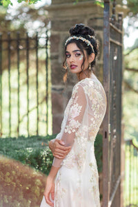 Romantic and whimsical floral lace wedding dress with poet sleeves. Blush, pale green and lavender. Handmade by Catherine Langlois, Toronto, Canada