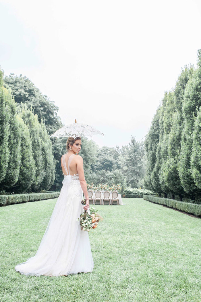 Romantic tulle wedding dress by Catherine Langlois. Made to order in Toronto, Canada.