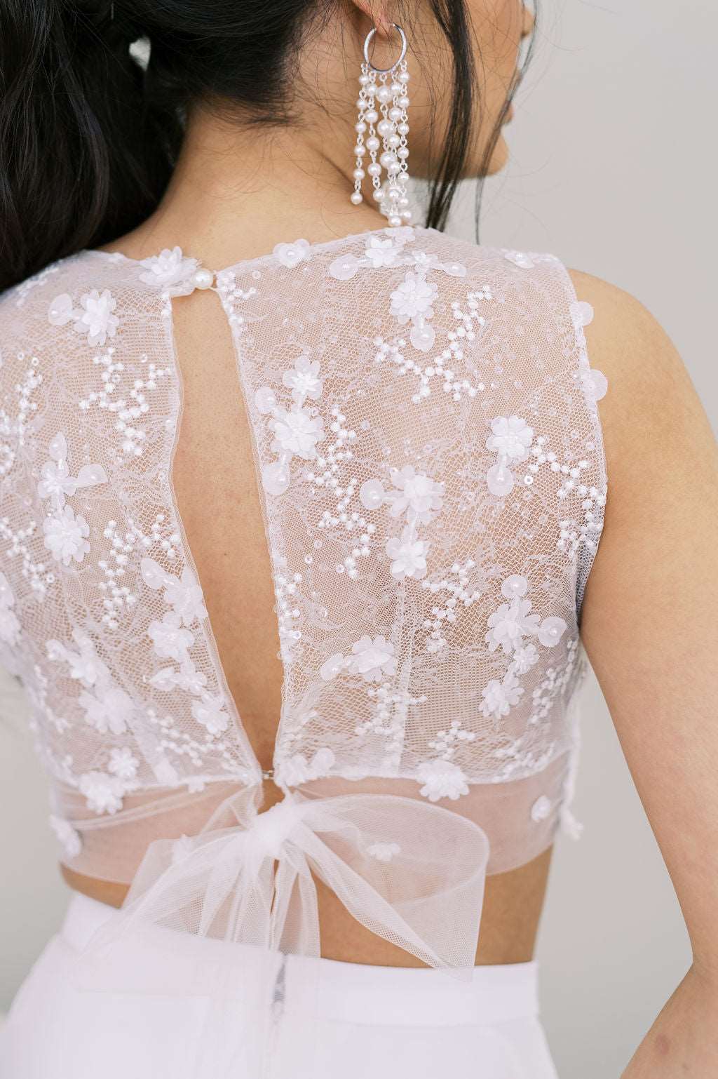 Chic whimsical bridal topper. Lace at back, crepe front. By Catherine Langlois, Toronto, Canada.