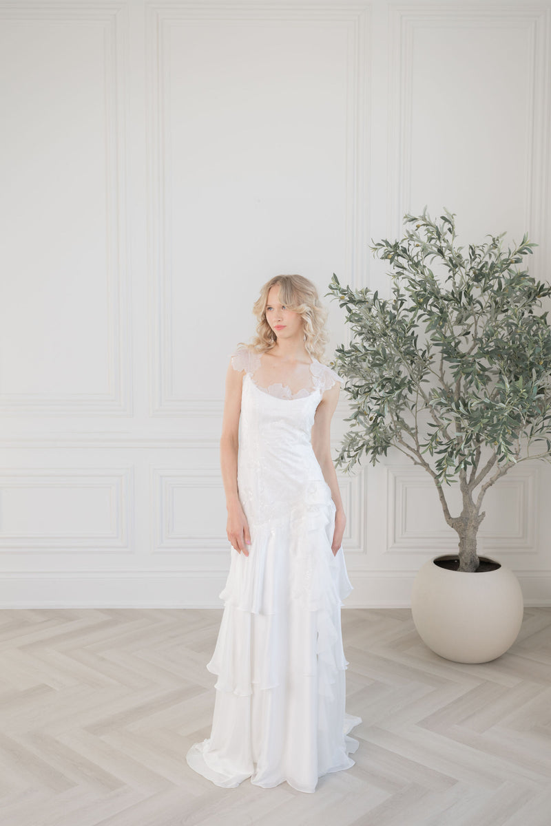 Pretty chiffon and beaded wedding dress. Square neckline, soft cap sleeves. Custom couture bridal gowns by Catherine Langlois, Toronto.