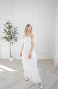 Modern pleated tulle wedding dress.  Strapless with arm bands. Custom  made bridal gowns by Catherine Langlois, Toronto.