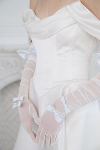 Beautiful satin corset wedding dress. Custom designed by Catherine Langlois Toronto, Canada. Toronto bridal studio shop.