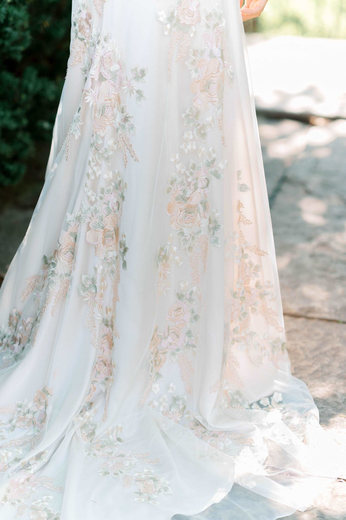 Floral A line wedding dress. . Colorful vintage floral lace wedding gown. Classic A line, elbow flutter sleeves, deep V neckline. Designed by Catherine Langlois Bridal, Canada.