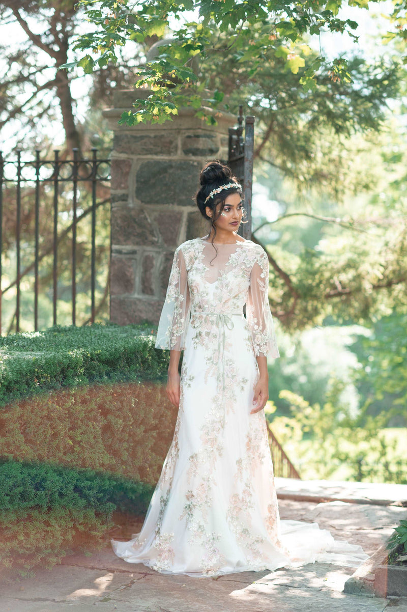 Colorful vintage floral lace wedding dress. Classic A line, elbow flutter sleeves, deep V neckline. Designed by Catherine Langlois Bridal, Canada.