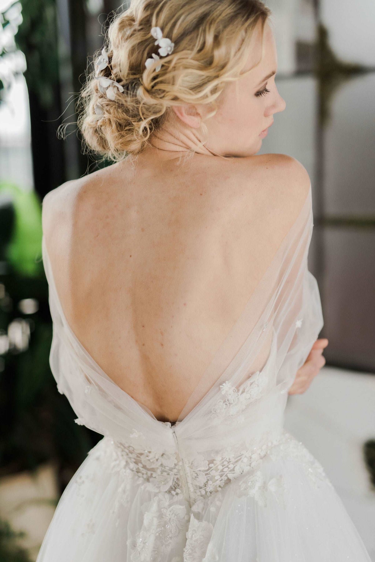 Ethereal off the shoulder Canadian wedding dress. Custom designed romantic wedding dresses custom made in Toronto. Shop our local Toronto bridal studio.