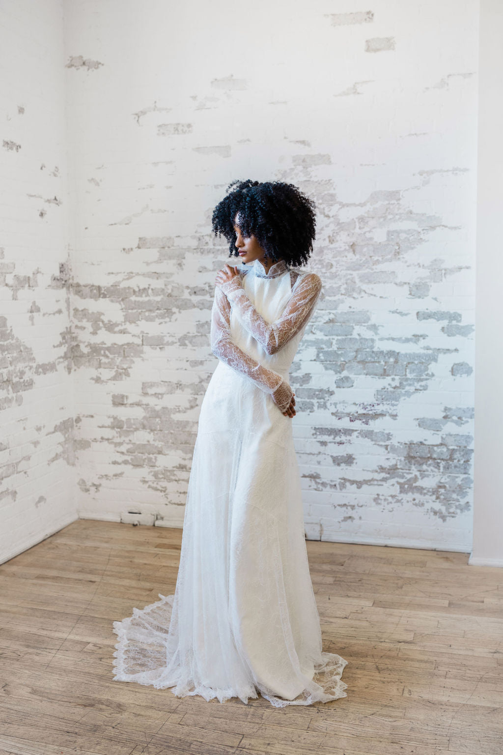 High neck sheer lace wedding dress overlay long sleeves. Bridal separates. Custom made in Toronto, Canada.