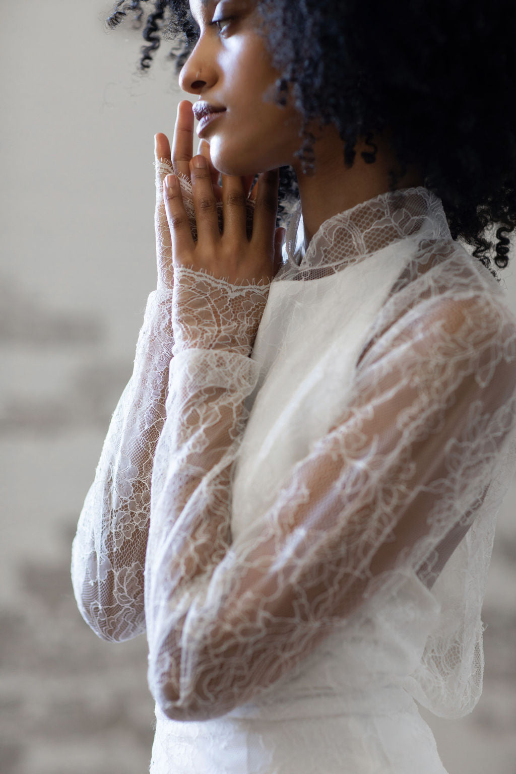 Sheer lace wedding dress overlay long sleeves. Bridal separates. Custom made in Toronto, Canada.