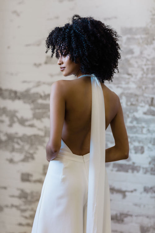 Unique halter neck bridal jumpsuit with a low back. Made in Canada by Catherine Langlois.