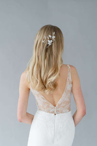 Canadian custom wedding dress. Simple v neck crepe wedding dress by Catherine Langlois. Leaf lace applique and flare bridal gown in stretch crepe. Wedding dressmaker in Toronto.