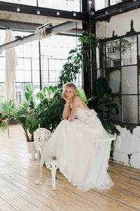 Rhys, an ethereal tulle and lace wedding dress by Catherine Langlois. Designed to order in Toronto, Ontario, Canada.