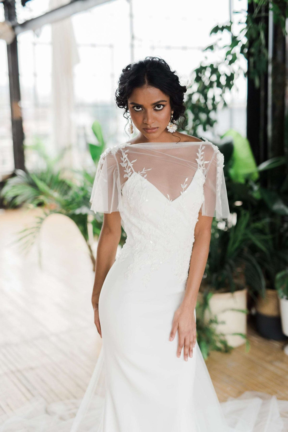 Simple and delicate slim crepe wedding dress with a detachable train. Designed by Catherine Langlois in Toronto, Ontario, Canada.
