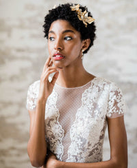 Simple crepe and lace wedding dress designed by Catherine Langlois. Modern lace with hints of pewter and an elegant A line skirt.