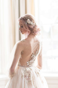 Whimsical, romantic and airy, the Jasmine wedding dress by Catherine Langlois will leave you breathless. Designed in Toronto, Ontario, Canada.