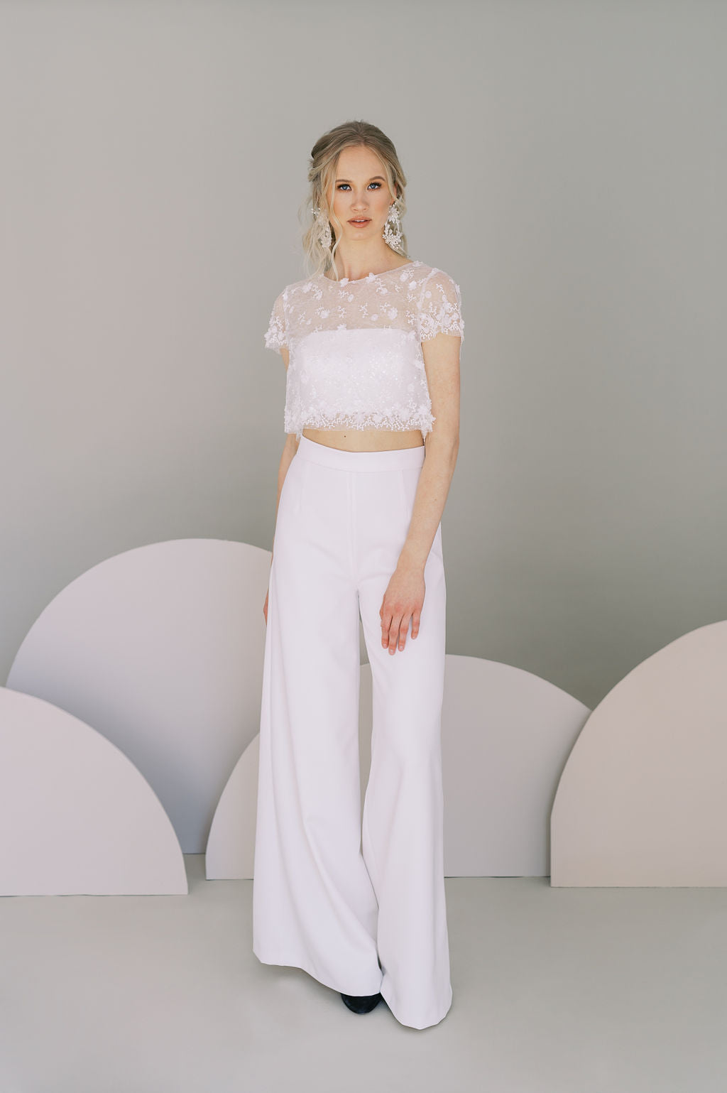 Cool bride wedding pants for a casual bridal outfit. Stretch crepe palazzo trousers with a tapered fit at the waist. Designed by Catherine Langlois, Canada.