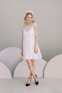 Short cotton lace wedding dress. A line with cap sleeves and crepe slip Handmade by Catherine Langlois,Toronto, Canada.