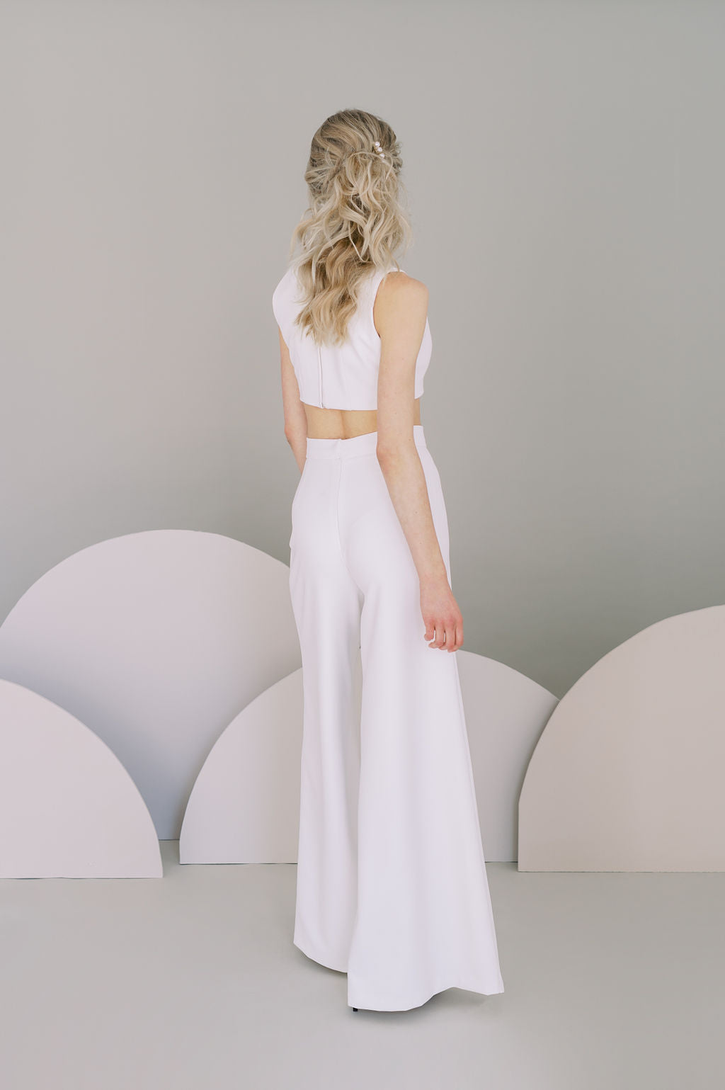 Wedding crop top in stretch crepe. Shown with crepe palazzo pants. Custom made by Catherine Langlois, Toronto, Canada.