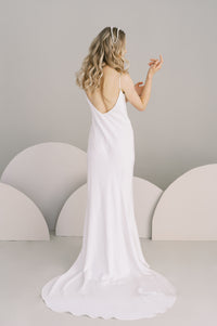 Simple silk slip wedding dress with a low v back. Also available in eco crepe. Made to order by Catherine Langlois, Toronto, Canada.