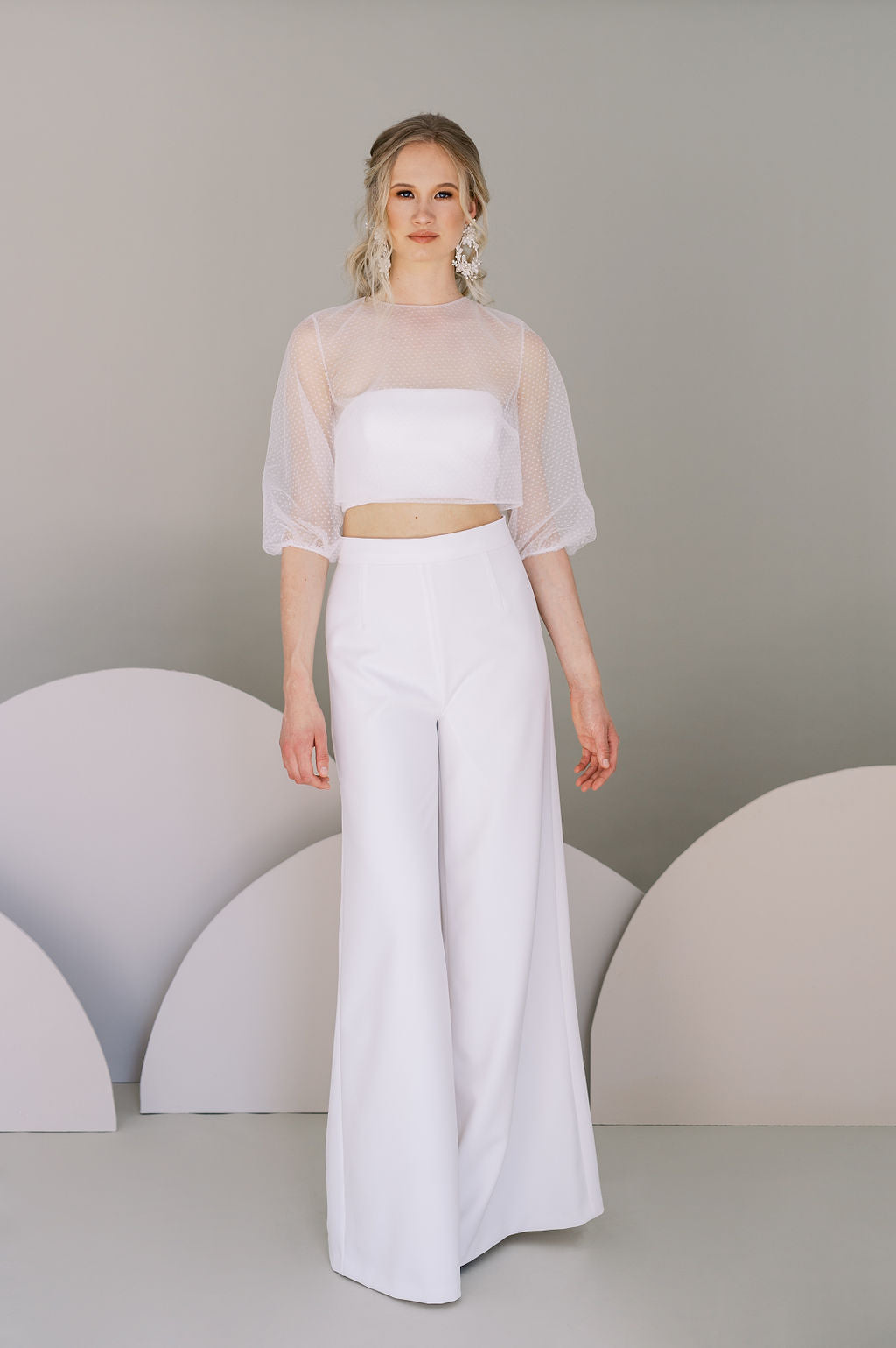 Chic bridal wedding pants for a casual bridal outfit. Stretch crepe palazzo trousers with a tapered fit at the waist. Designed by Catherine Langlois, Canada.