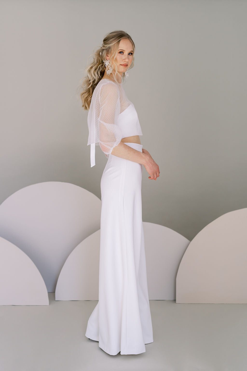 Chic bride wedding pants for a casual bridal outfit. Stretch crepe palazzo trousers with a tapered fit at the waist. Designed by Catherine Langlois, Canada.