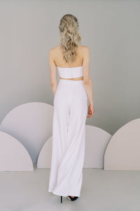 Modern wedding pants for an informal bridal outfit. Stretch crepe palazzo trousers with a tapered fit at the waist. By Catherine Langlois, Canada.