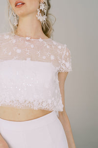 Bandeau wedding top, worn with stretch crepe wedding pants and a sheer 3D lace tulle topper. Catherine Langlois, Toronto, Canada.
