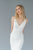 Simple v neck crepe wedding dress by Catherine Langlois. Leaf lace applique and train, fit and flare gown in stretch crepe. Handmade in Toronto, Canada.
