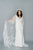 Romantic yet classic crepe and tulle wedding dress. Whimsical 3D applique with tulle flutter sleeves and train. Empire line and V neckline. Custom made in Toronto by Catherine Langlois.