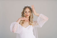 Long sequin wedding cape. Long poet sleeves. Handmade by Catherine Langlois, Toronto.