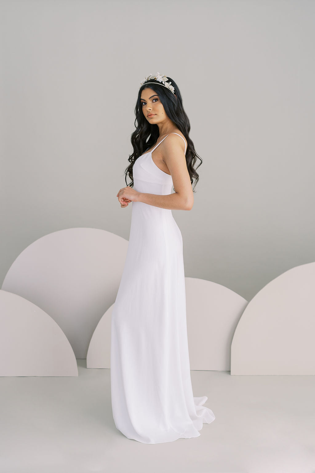 Simple, Aline, spaghetti strap crepe wedding dress. Off the rack sample sale. Made in Toronto, Canada. Custom gowns expertly made by Catherine Langlois.